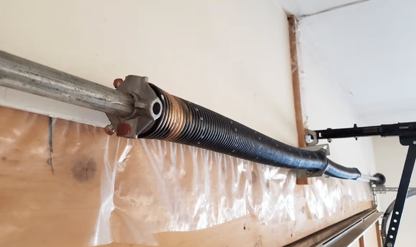 how to adjust garage door springs